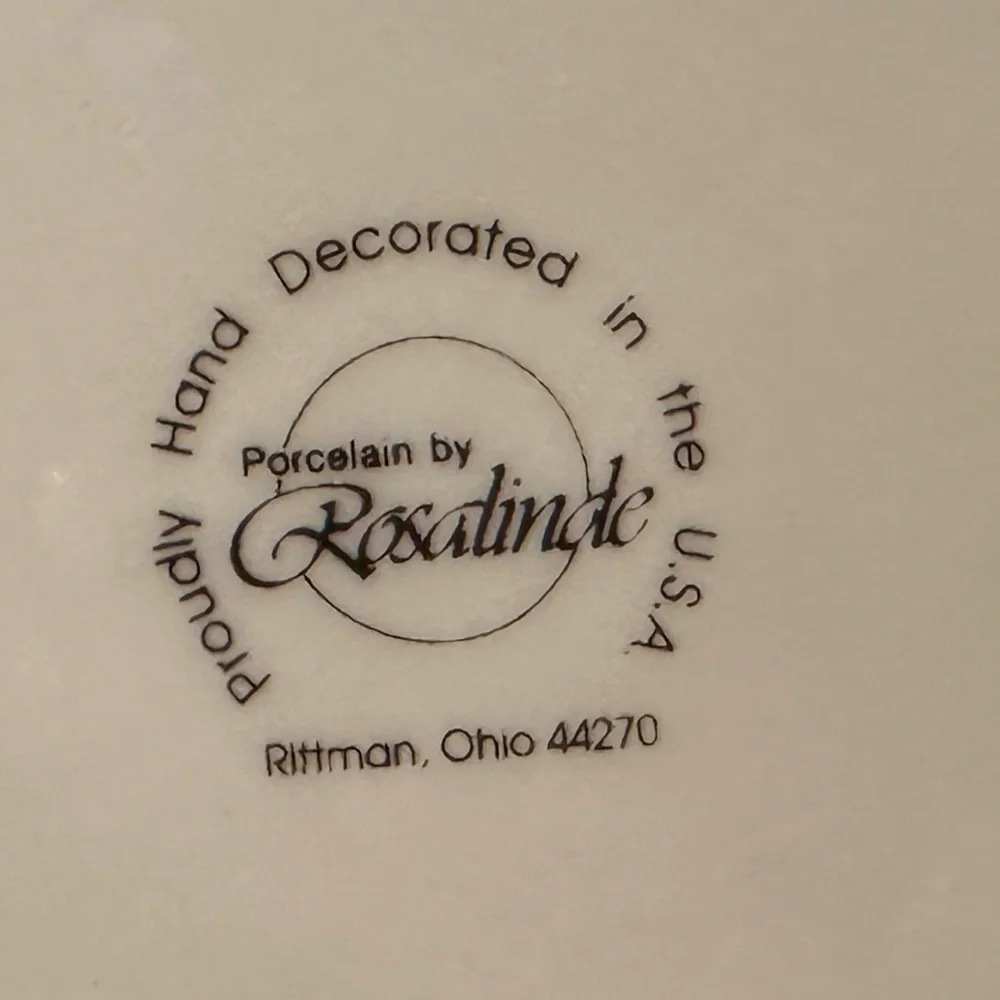 Rosalinde white dog bowl with Rottweiler and paw prints decor. Good shape.